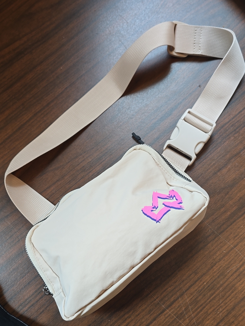 Beige Crossbody Fanny Pack with Pink Graphic Accent - Picture 1 of 6